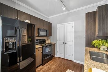 Kitchen with black appliances